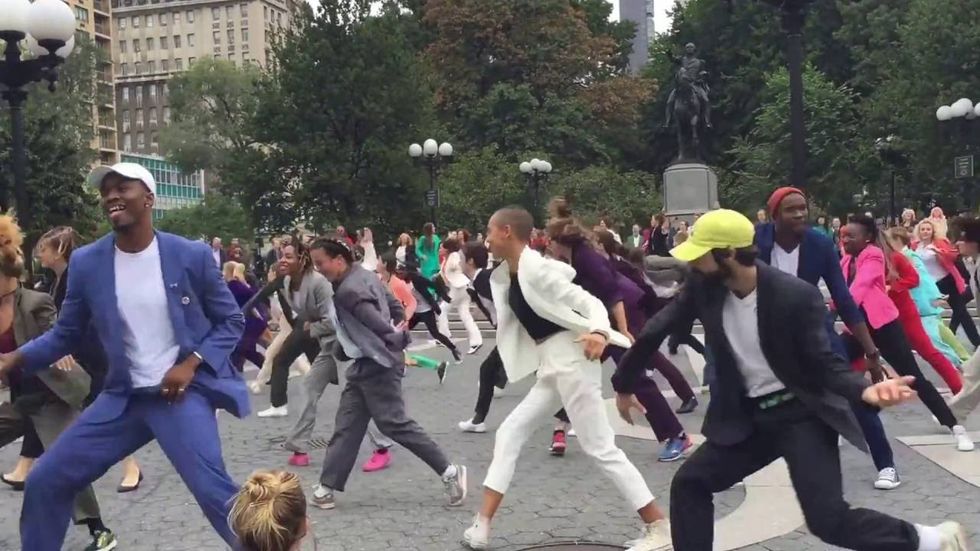 On Sunday, Oct. 2, an enthusiastic flashmob took over New York City's Union Square in homage to Hillary Clinton's signature look.The group, all donning Hillary's classic pantsuit, danced to Justin Timberlake's "Can't Stop The Feeling!" in order to "combine art with a bit of activism," Crishon Jerom....