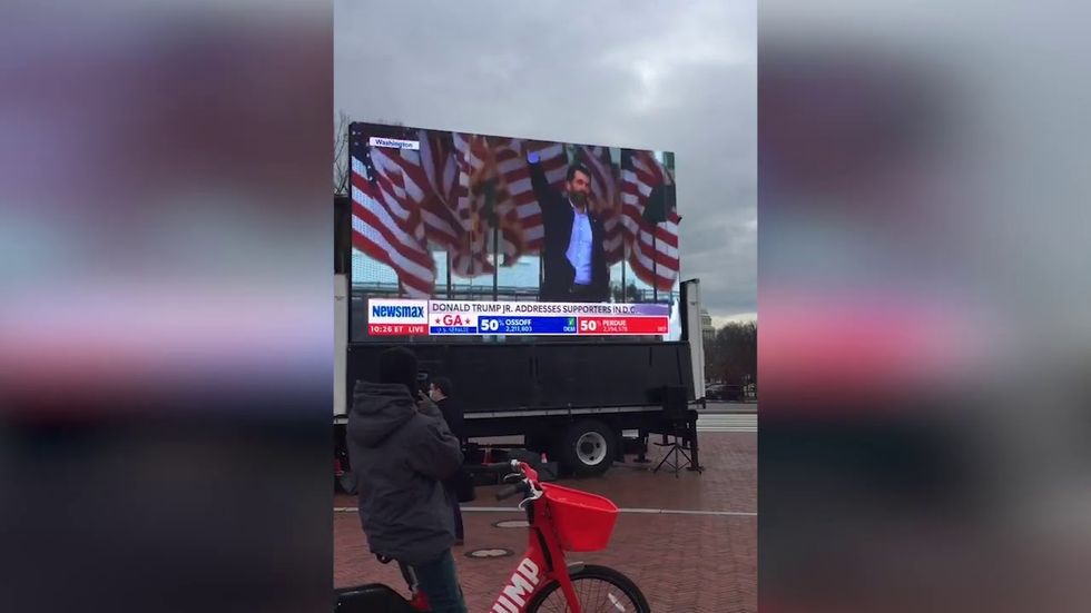 Did you know that @MeidasTouch was putting a jumbotron right outside of the U.S. Capitol to remind everyone of the insurrectionists serving in Congress? Consider supporting them and sharing this so that others can too!  https://t.co/P1v46XRL3A